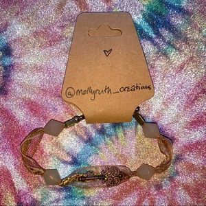 Handmade gold/copper ribbon key bracelet